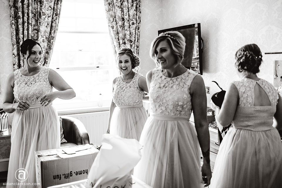 Bridesmaids preparing for a wedding at Kenwick Park.