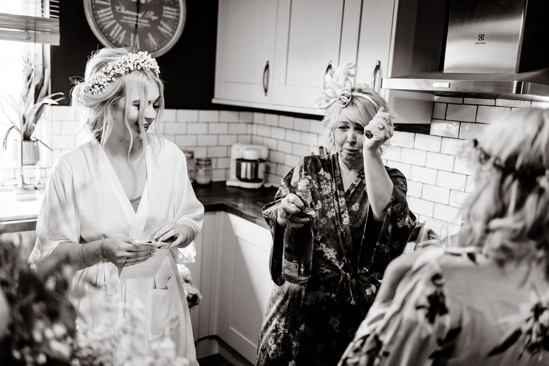 Wedding party getting ready in the kitchen at Scrivelsby Walled Garden.