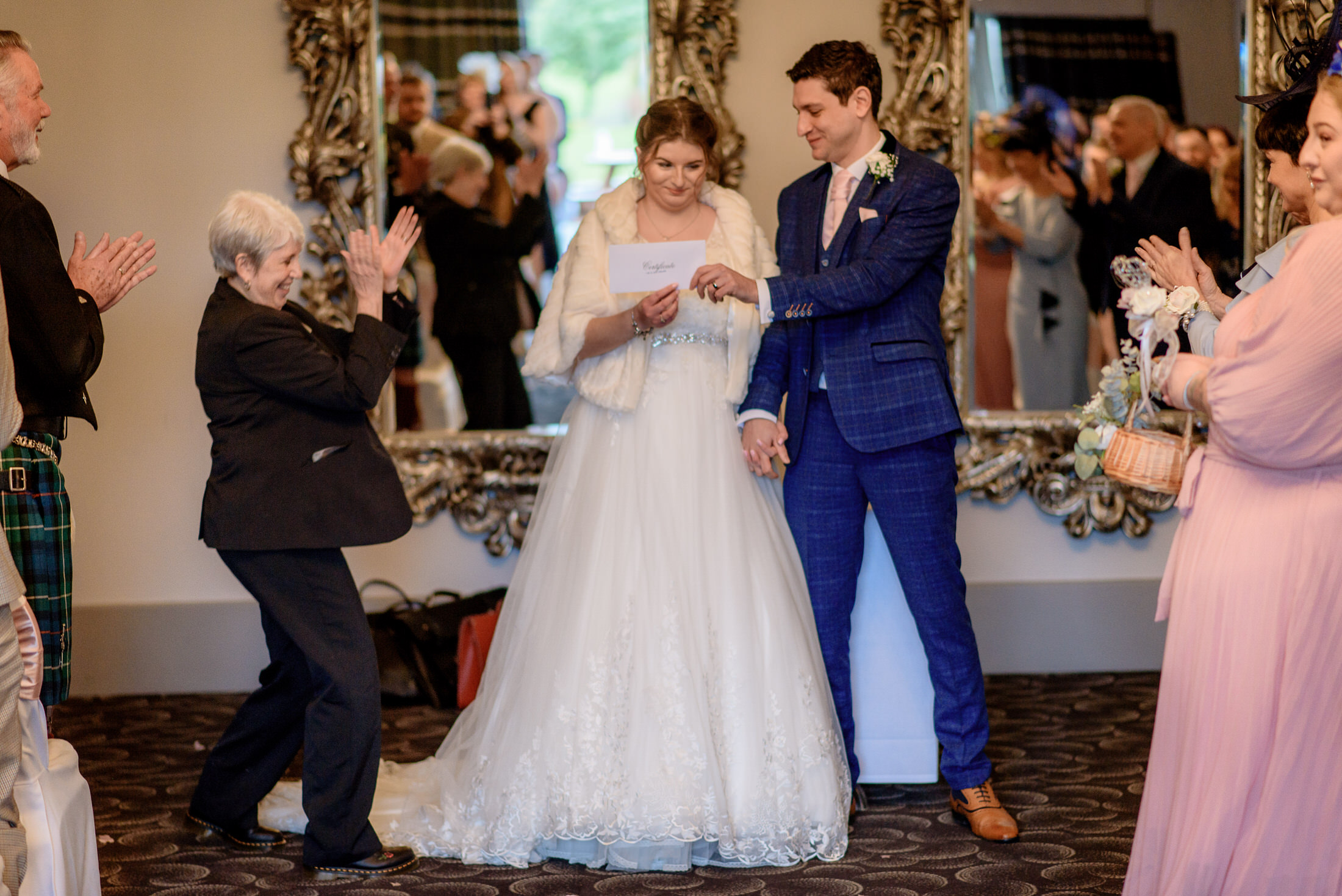 A bride and groom exchanging their vows at a Brackenborough Hotel wedding ceremony.