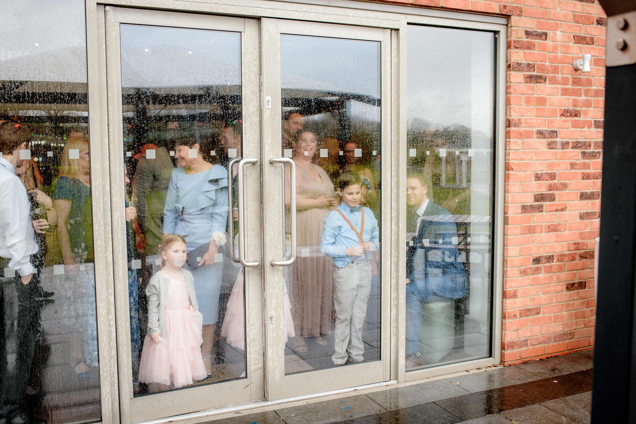 A group of people standing outside Brackenborough Hotel.